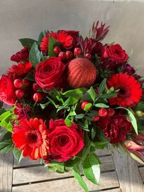 Kerstboeket "warme rode tinten"